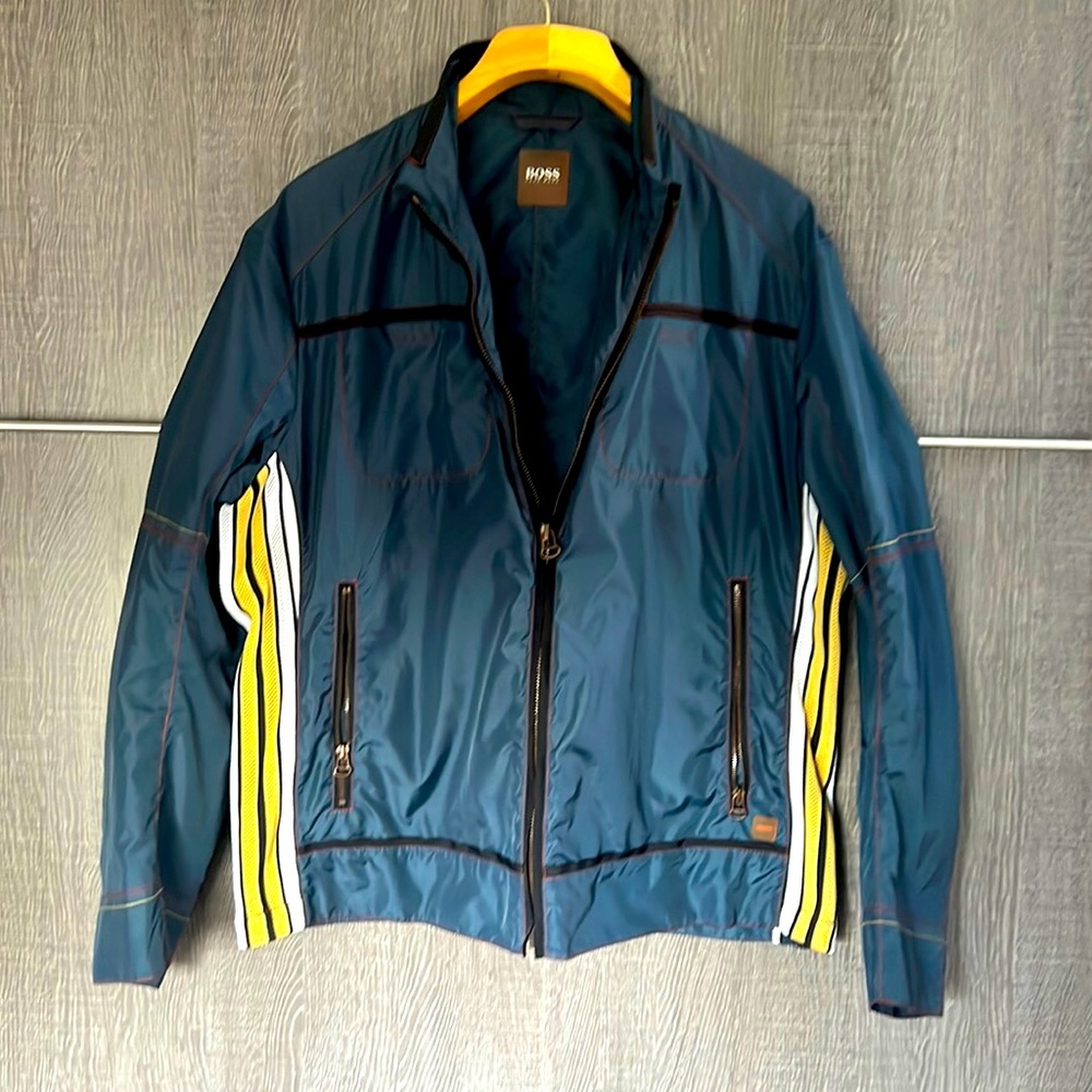 Hugo Boss Men’s windbreaker.  Awesome blue green color size large